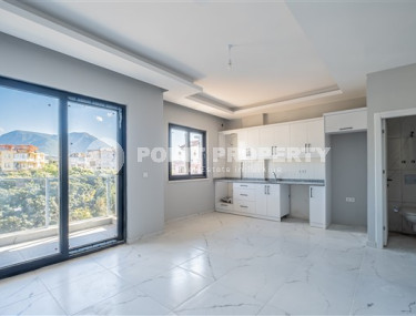 Дуплекс 2+1 в новом здании в полутора километрах от моря.-id-3576-фото-2