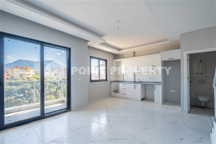 Дуплекс 2+1 в новом здании в полутора километрах от моря.-id-3576-фото-2