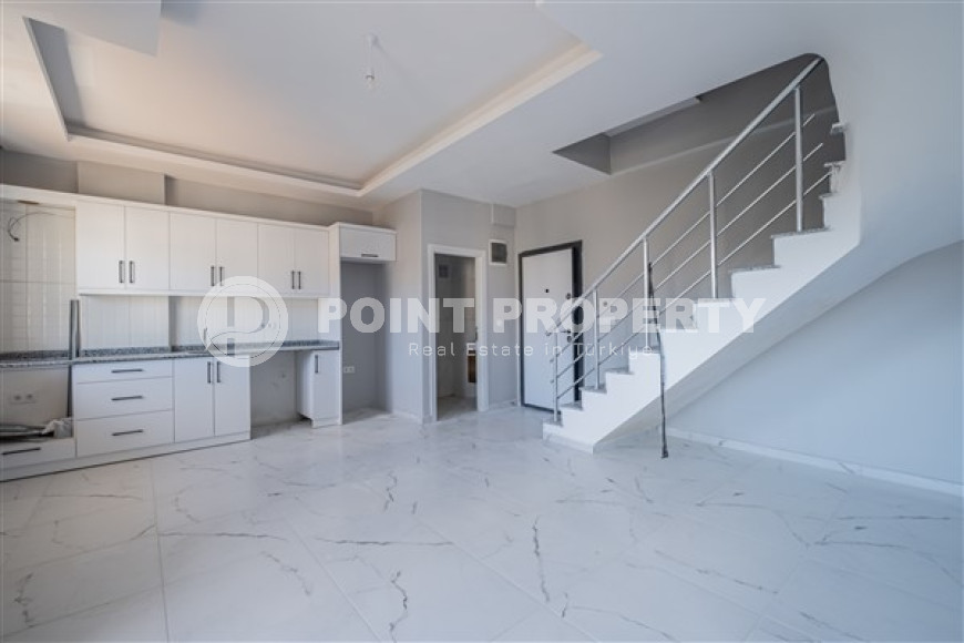 Дуплекс 2+1 в новом здании в полутора километрах от моря.-id-3576-фото-3