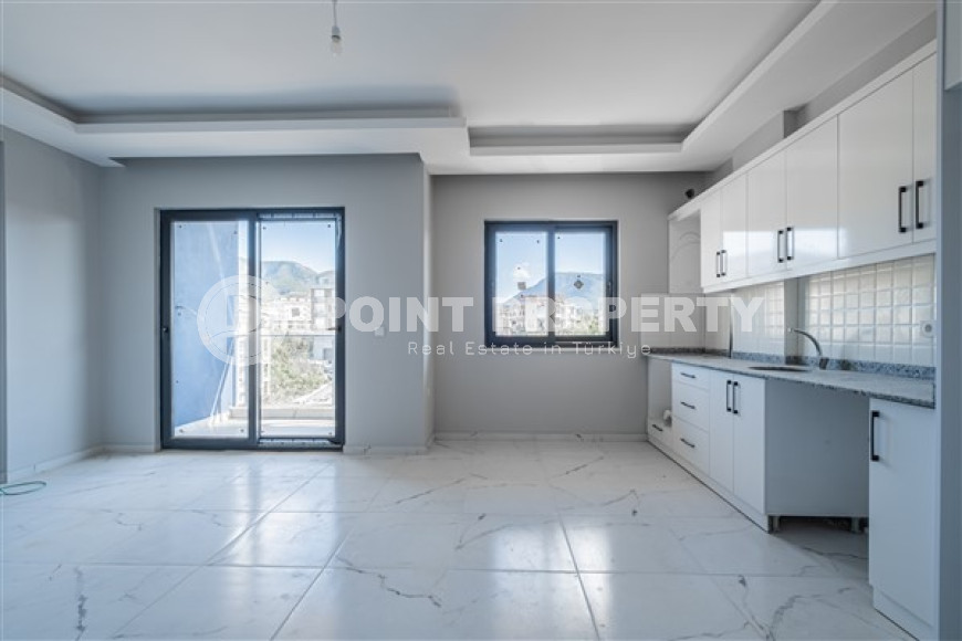 Дуплекс 2+1 в новом здании в полутора километрах от моря.-id-3576-фото-5