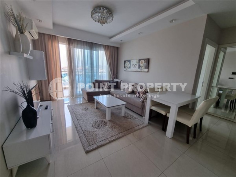 Просторная квартира 1+1 в центре района Махмутлар в 250 метрах от моря.-id-3578-фото-2