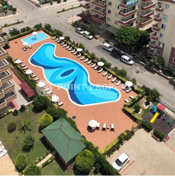 Просторная квартира 1+1 в центре района Махмутлар в 250 метрах от моря.-id-3578-фото-9