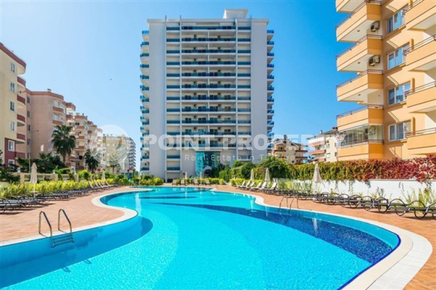 Просторная квартира 1+1 в центре района Махмутлар в 250 метрах от моря.-id-3578-фото-13