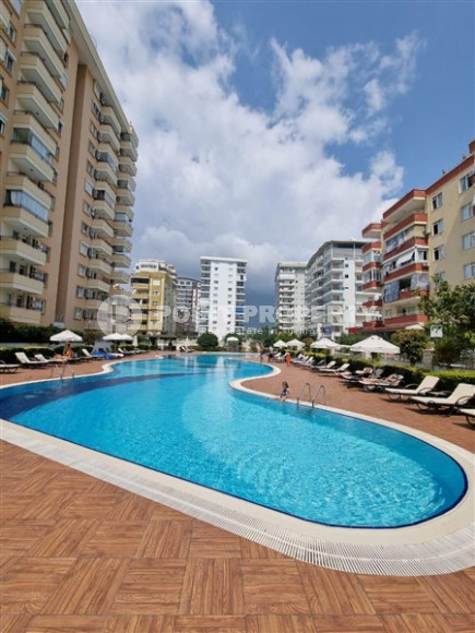 Просторная квартира 1+1 в центре района Махмутлар в 250 метрах от моря.-id-3578-фото-18