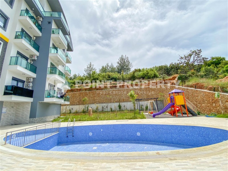 Two-level apartment with 2+1 layout with furniture and access to the terrace, Oba district, 86 m2-id-1307-photo-35