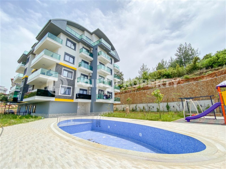 Two-level apartment with 2+1 layout with furniture and access to the terrace, Oba district, 86 m2-id-1307-photo-37