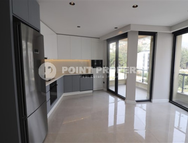 Небольшая квартира 1+1 в 150 метрах от знаменитого пляжа Клеопатры.-id-3592-фото-2