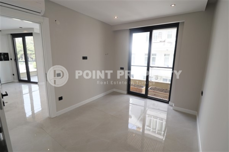 Небольшая квартира 1+1 в 150 метрах от знаменитого пляжа Клеопатры.-id-3592-фото-3