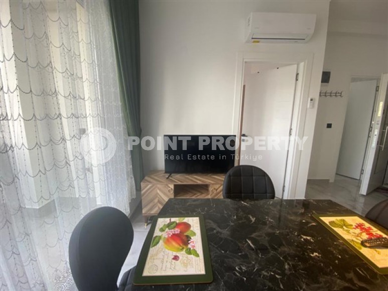 Небольшая квартира 1+1 на 8-м этаже в новом жилом комплексе.-id-3593-фото-2