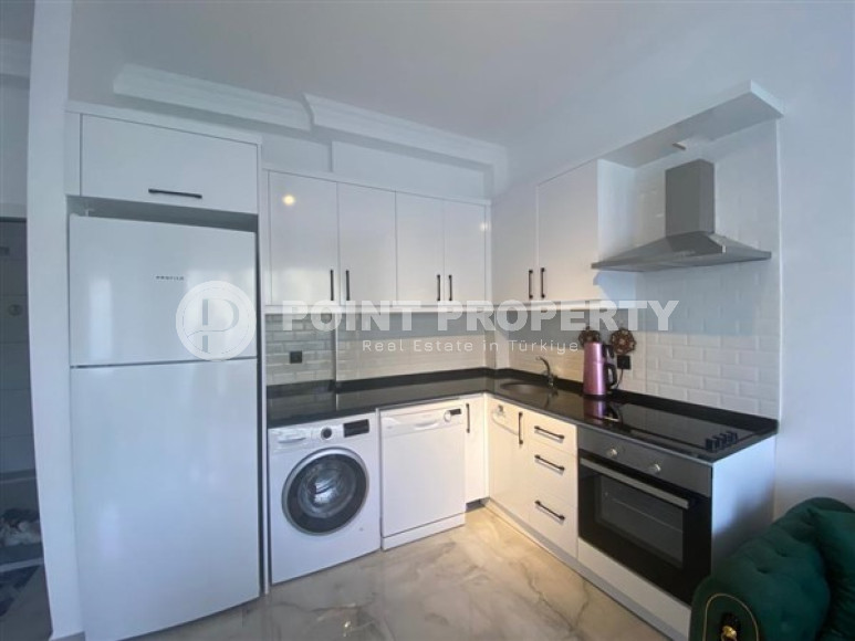 Небольшая квартира 1+1 на 8-м этаже в новом жилом комплексе.-id-3593-фото-3