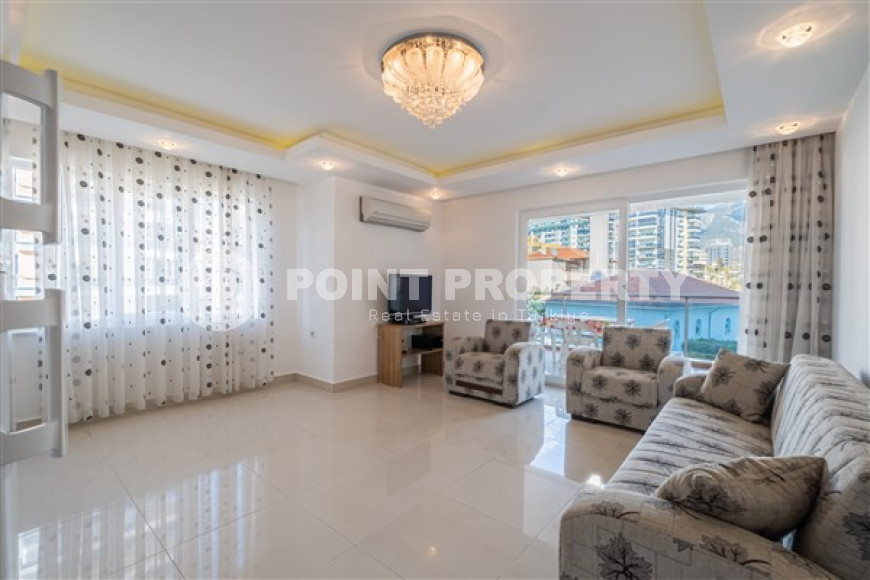 Spacious one bedroom apartment in the center of Mahmutlar.-id-3598-photo-1