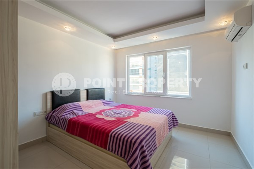 Просторная квартира с одной спальней в центре района Махмутлар.-id-3598-фото-3