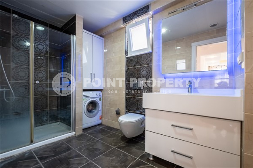 Просторная квартира с одной спальней в центре района Махмутлар.-id-3598-фото-4