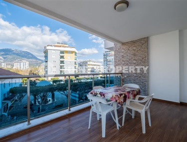 Просторная квартира с одной спальней в центре района Махмутлар.-id-3598-фото-5