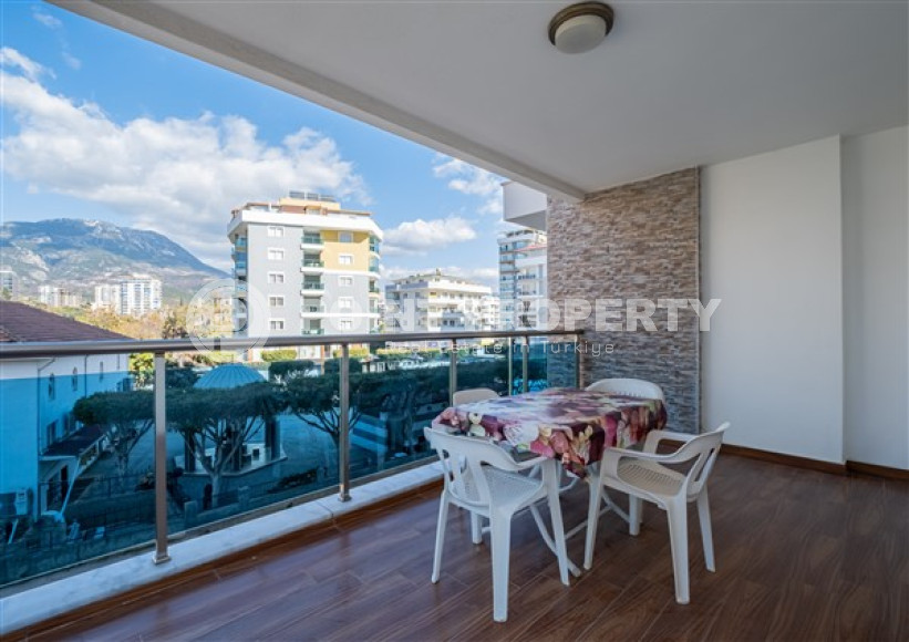 Просторная квартира с одной спальней в центре района Махмутлар.-id-3598-фото-5