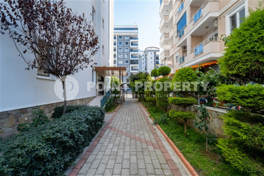 Просторная квартира с одной спальней в центре района Махмутлар.-id-3598-фото-6