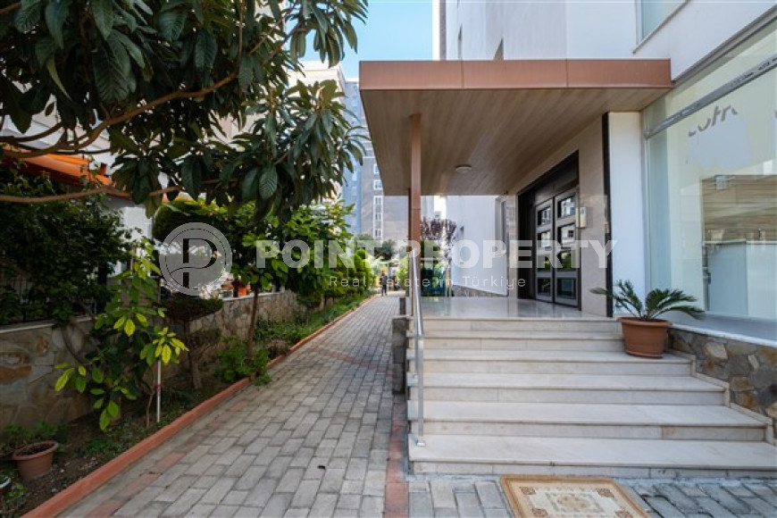 Просторная квартира с одной спальней в центре района Махмутлар.-id-3598-фото-9