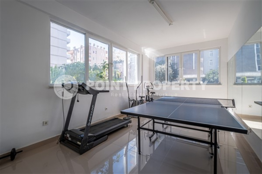 Просторная квартира с одной спальней в центре района Махмутлар.-id-3598-фото-10