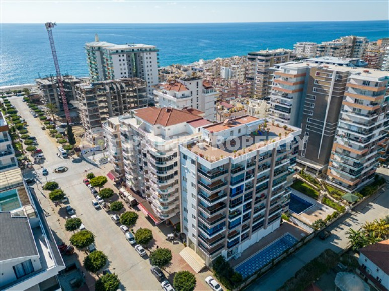 Просторная квартира с одной спальней в центре района Махмутлар.-id-3598-фото-13