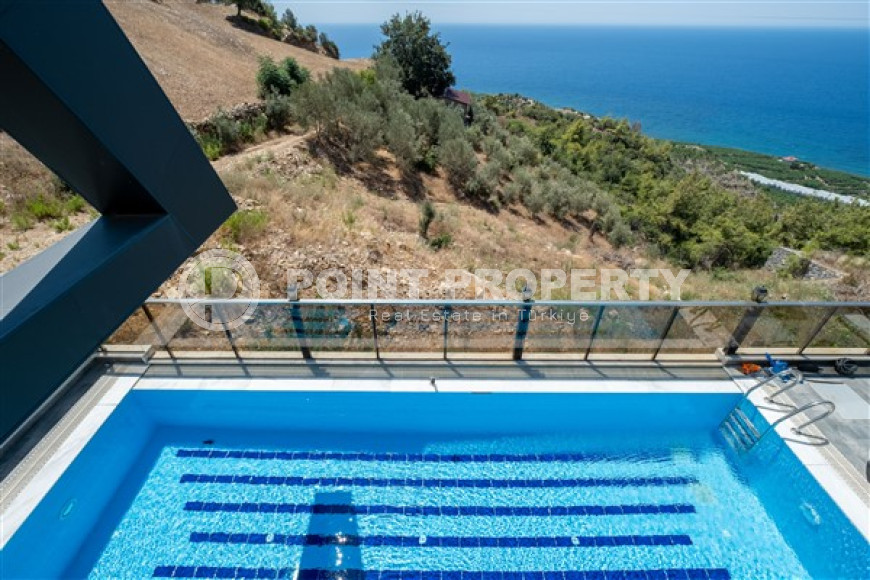 Роскошная вилла 3+1 с панорамным видом на море в районе Каргыджак.-id-3599-фото-18