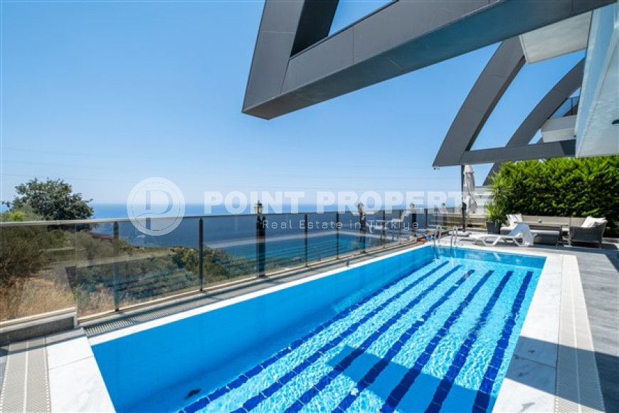 Роскошная вилла 3+1 с панорамным видом на море в районе Каргыджак.-id-3599-фото-21