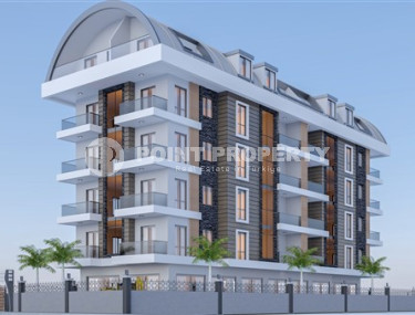 Small apartment of 50 m2 in a complex at the final stage of construction 150 meters from the sea, the center of Alanya-id-3609-photo-1