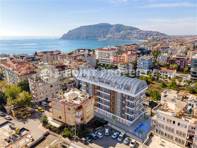 Небольшие апартаменты 50 м2 в комплексе на завершающем этапе строительства в 150 метрах от моря, центр Аланьи-id-3609-фото-9