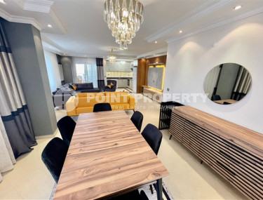 Великолепный дуплекс на 6-м этаже с мансардой в современном районе Тюрклер.-id-3611-фото-3