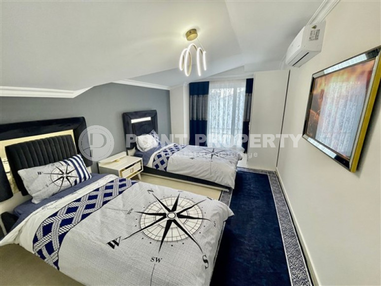 Великолепный дуплекс на 6-м этаже с мансардой в современном районе Тюрклер.-id-3611-фото-7