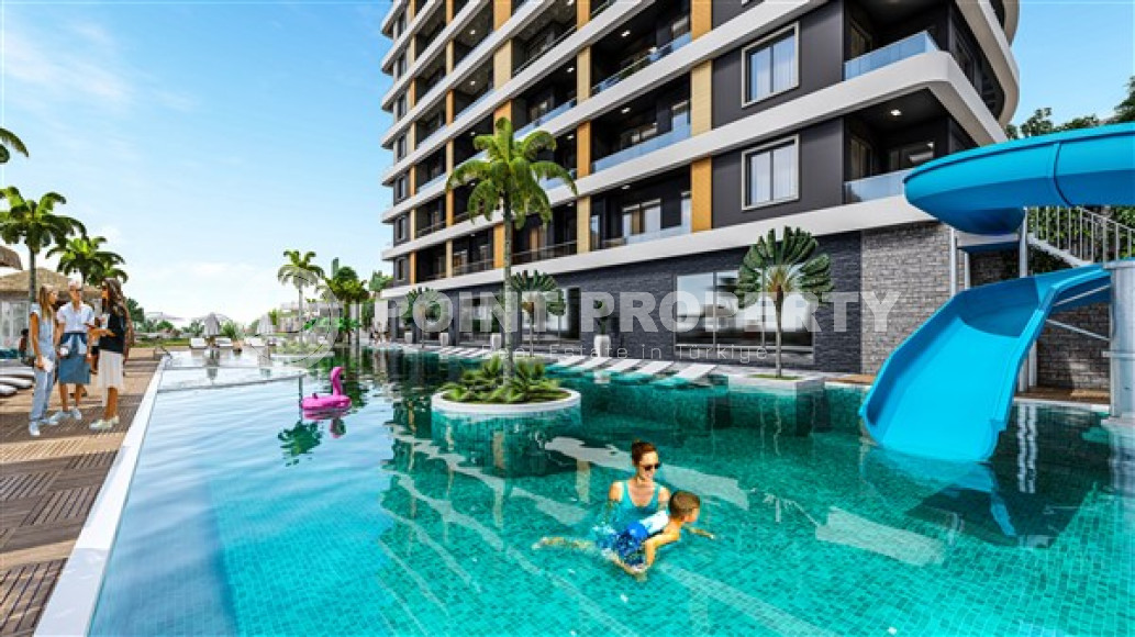 Двухуровневые апартаменты 100 м2 в строящейся резиденции с собственным пляжем, район Авсаллар-id-3622-фото-5