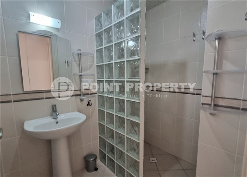 Двухуровневая квартира 4+1 в 400 метрах от моря в центре района Махмутлар.-id-3637-фото-11