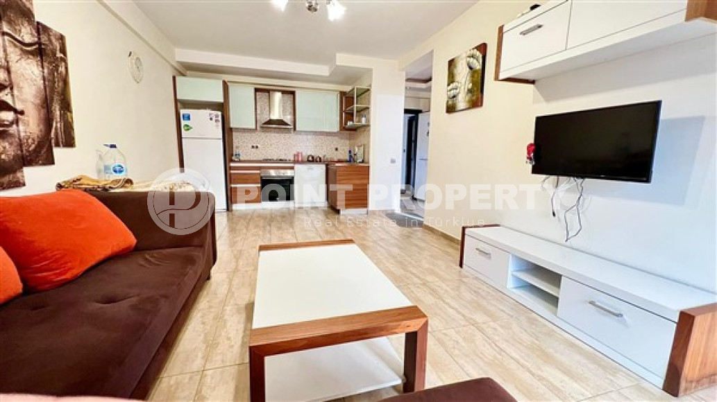 Компактная светлая квартира 1+1 в 300 метрах от  центра района Махмутлар.-id-3640-фото-3