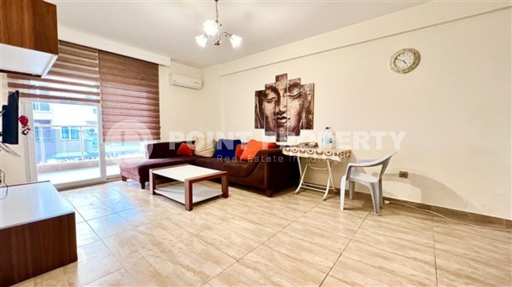 Компактная светлая квартира 1+1 в 300 метрах от  центра района Махмутлар.-id-3640-фото-4