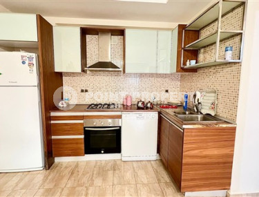 Компактная светлая квартира 1+1 в 300 метрах от  центра района Махмутлар.-id-3640-фото-5