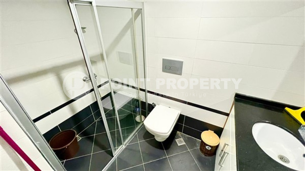 Компактная светлая квартира 1+1 в 300 метрах от  центра района Махмутлар.-id-3640-фото-8