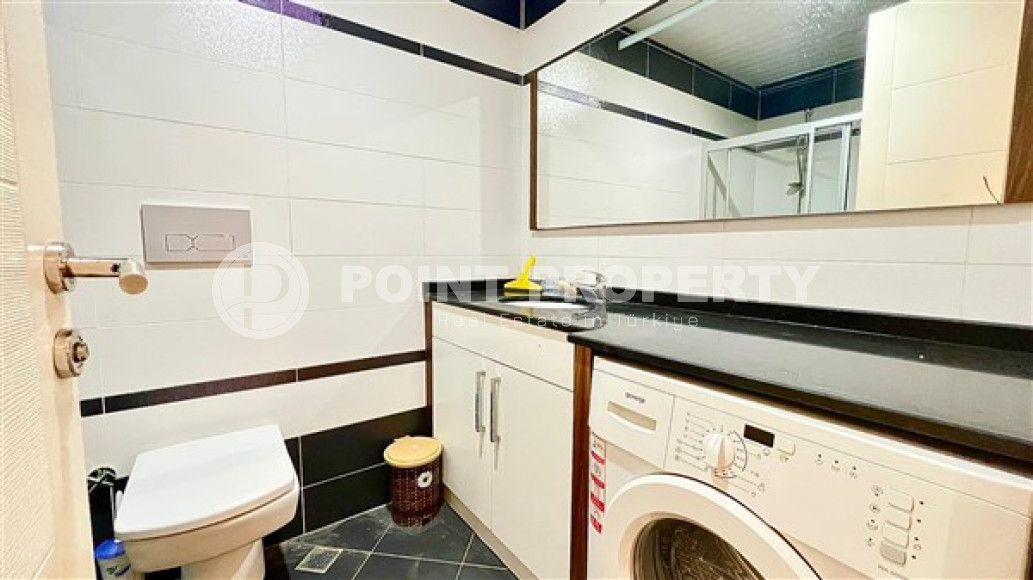 Компактная светлая квартира 1+1 в 300 метрах от  центра района Махмутлар.-id-3640-фото-9