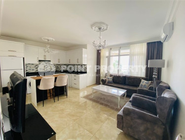 Cozy three-room apartment 112 m2 with three balconies, Mahmutlar district-id-3643-photo-1