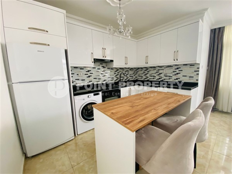 Cozy three-room apartment 112 m2 with three balconies, Mahmutlar district-id-3643-photo-13