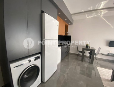Stylish one-bedroom apartment, 55m², in a cozy complex at the foot of the mountains in Oba, Alanya-id-1317-photo-2