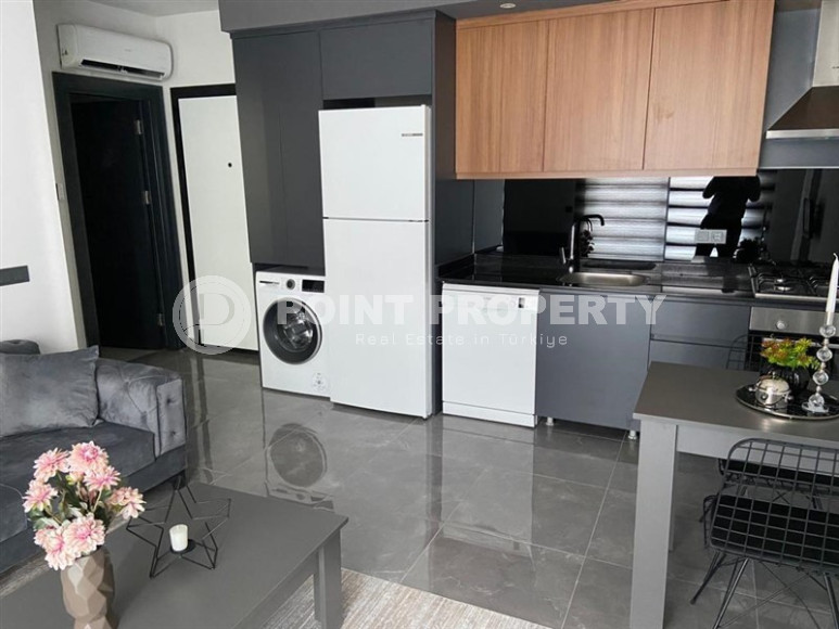 Stylish one-bedroom apartment, 55m², in a cozy complex at the foot of the mountains in Oba, Alanya-id-1317-photo-3