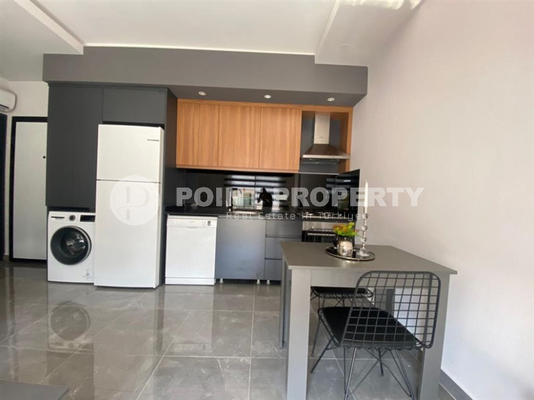 Stylish one-bedroom apartment, 55m², in a cozy complex at the foot of the mountains in Oba, Alanya-id-1317-photo-4