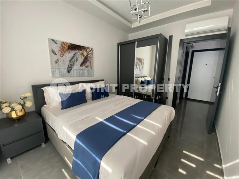 Stylish one-bedroom apartment, 55m², in a cozy complex at the foot of the mountains in Oba, Alanya-id-1317-photo-5