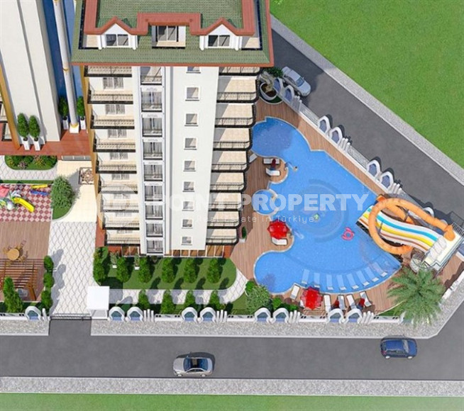 Красивая двухкомнатная квартира 53 м2, центр Аланьи, в строящейся резиденции с отельной инфраструктурой-id-3649-фото-2