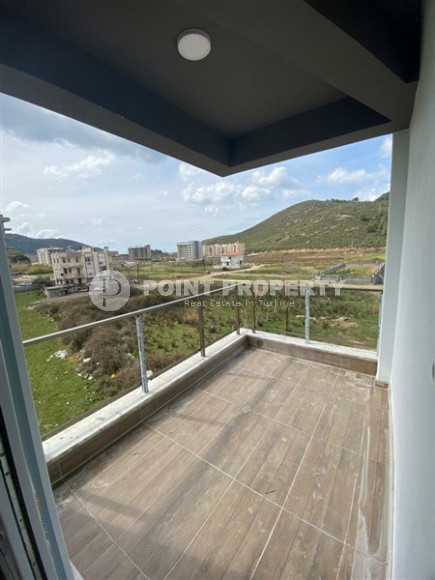 Compact apartment 58 m2 in a low-rise complex under construction, Gazipasa-id-3655-photo-5