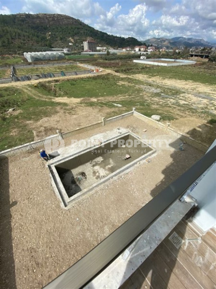 Compact apartment 58 m2 in a low-rise complex under construction, Gazipasa-id-3655-photo-9