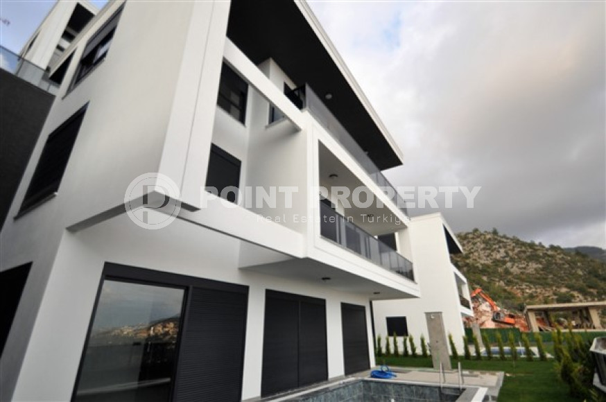 Вилла планировкой 5+1 с жилой площадью 270 м2 на стадии завершения строительства, центр Аланьи, Тепе-id-3660-фото-2