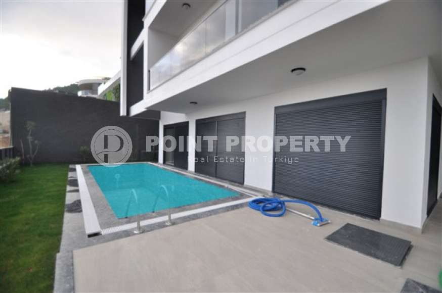 Вилла планировкой 5+1 с жилой площадью 270 м2 на стадии завершения строительства, центр Аланьи, Тепе-id-3660-фото-4