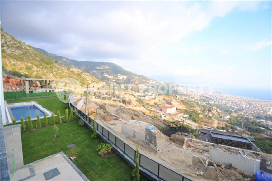 Вилла планировкой 5+1 с жилой площадью 270 м2 на стадии завершения строительства, центр Аланьи, Тепе-id-3660-фото-16