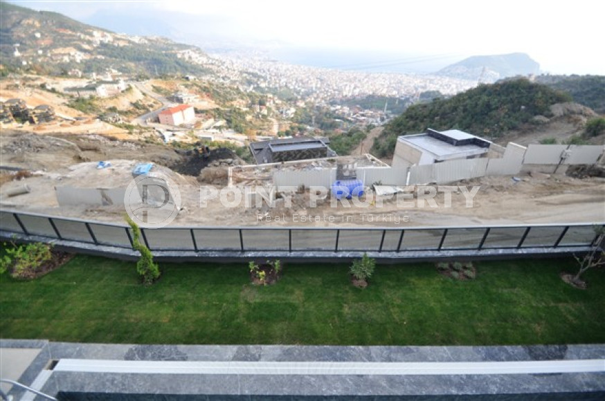 Вилла планировкой 5+1 с жилой площадью 270 м2 на стадии завершения строительства, центр Аланьи, Тепе-id-3660-фото-17