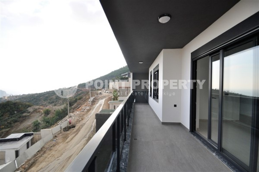 Вилла планировкой 5+1 с жилой площадью 270 м2 на стадии завершения строительства, центр Аланьи, Тепе-id-3660-фото-22